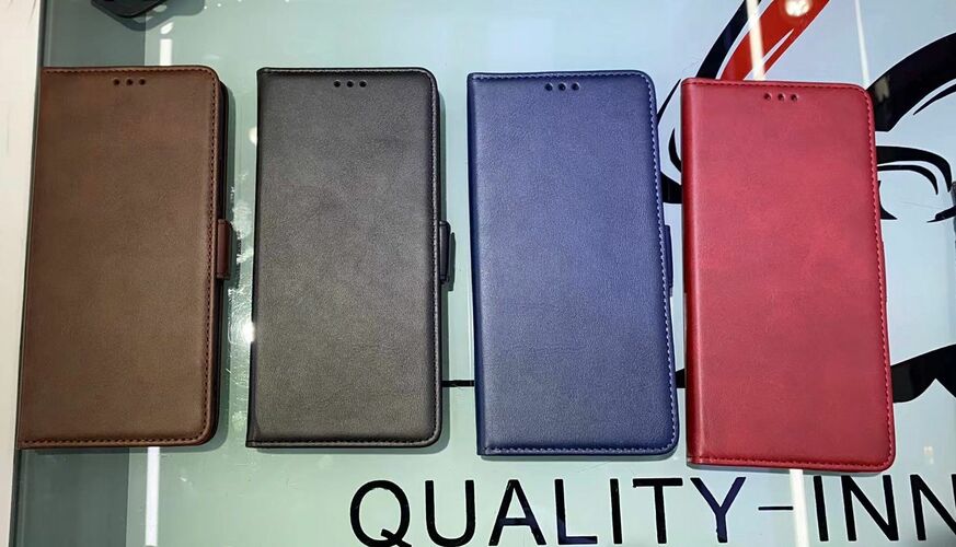 Чехол-книжка Itel A70 черный горизонтальный с магнитом Кожа